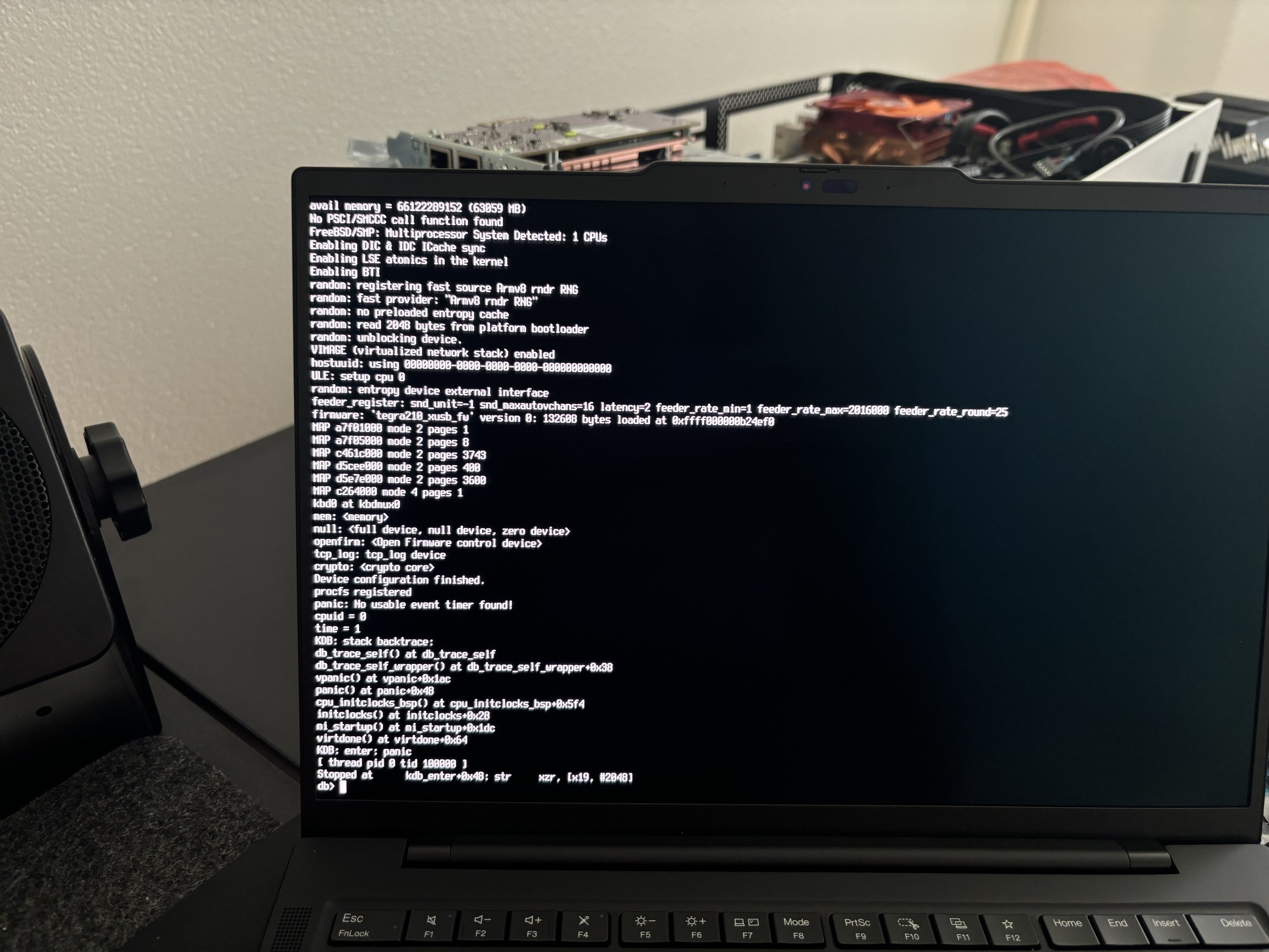 Boot process screen with a kernel panic, showing sequence and debug details from FreeBSD 14.1 on an arm64 laptop, Thinkpad T14s Gen6