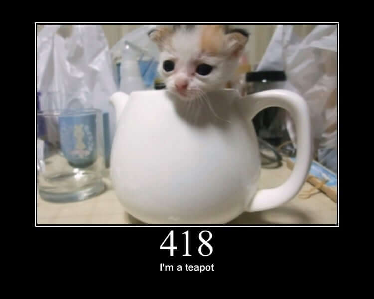 picture of a smol cat sitting in a teapot with black border and text underneath saying "I'm a teapot"