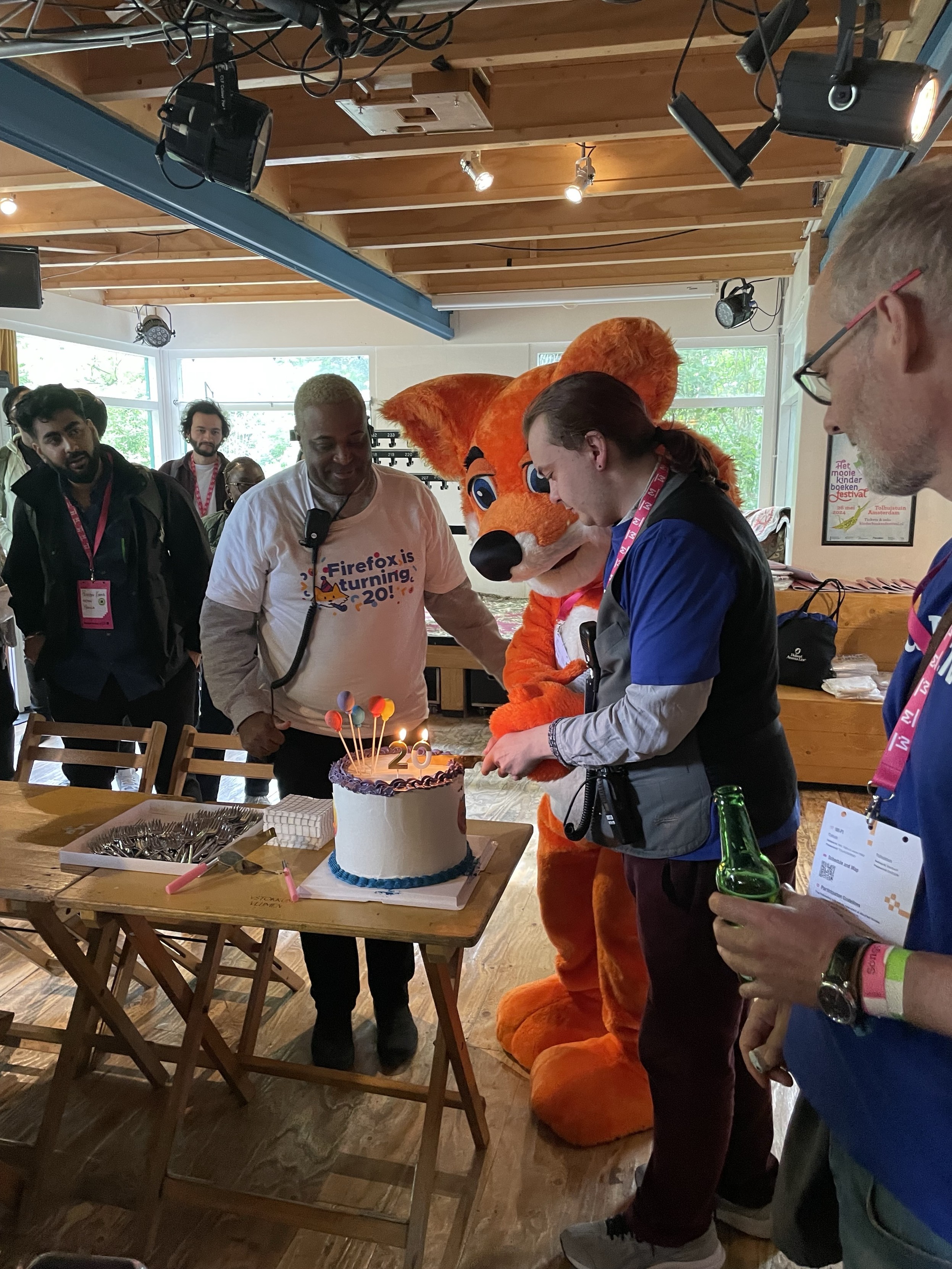 Foxie cutting their 20 yo birthday cake