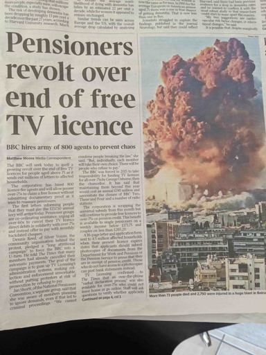 Picture of a newspaper with the headline "Pensioners revolt over end of free TV licence" next to an image from a separate article showing a building getting blown up.