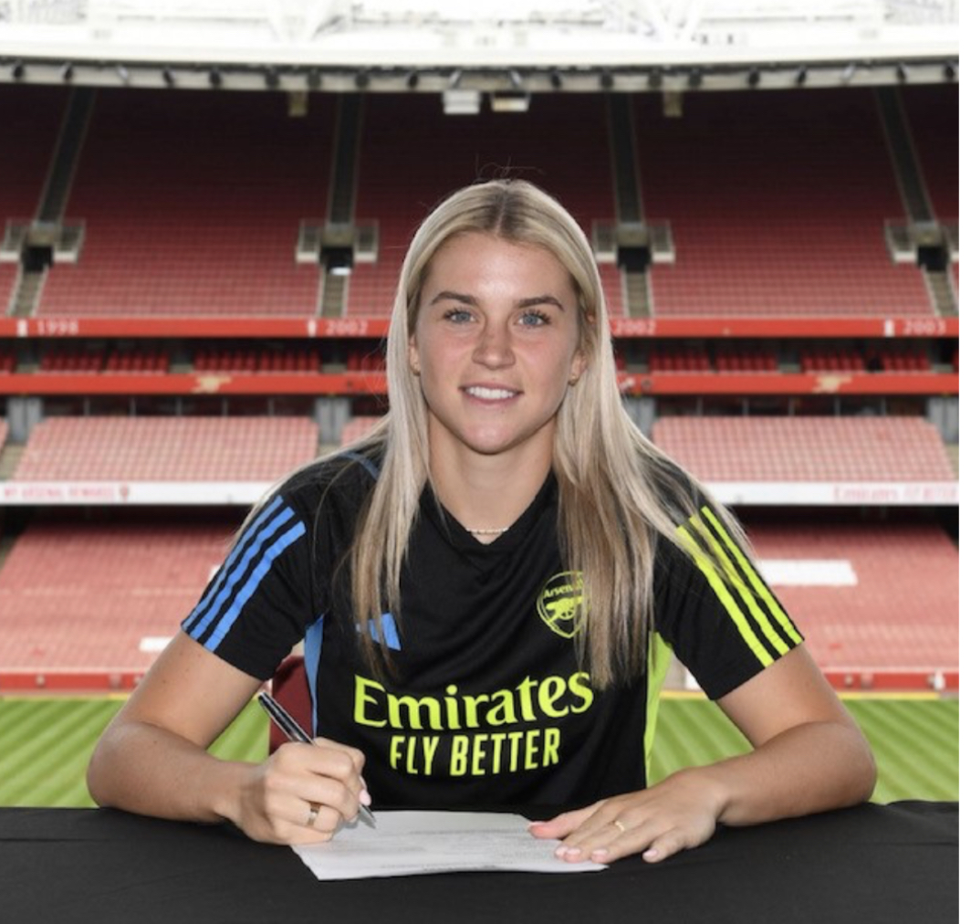 Photo of Alessia Russo at Emirates Stadium, the new Arsenal Women's Football Club striker, "signing" her contact.