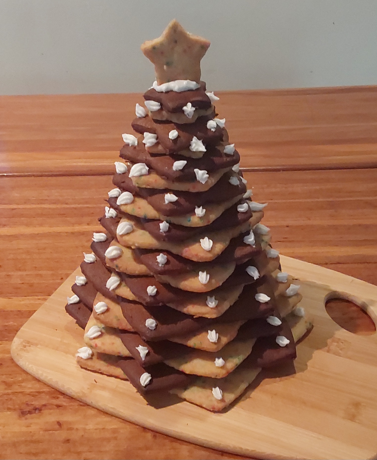 Christmas tree made from a pile of star shaped biscuits