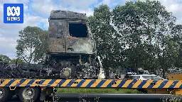 Exclusion zone established after crash involving truck carrying hazardous material south of Brisbane