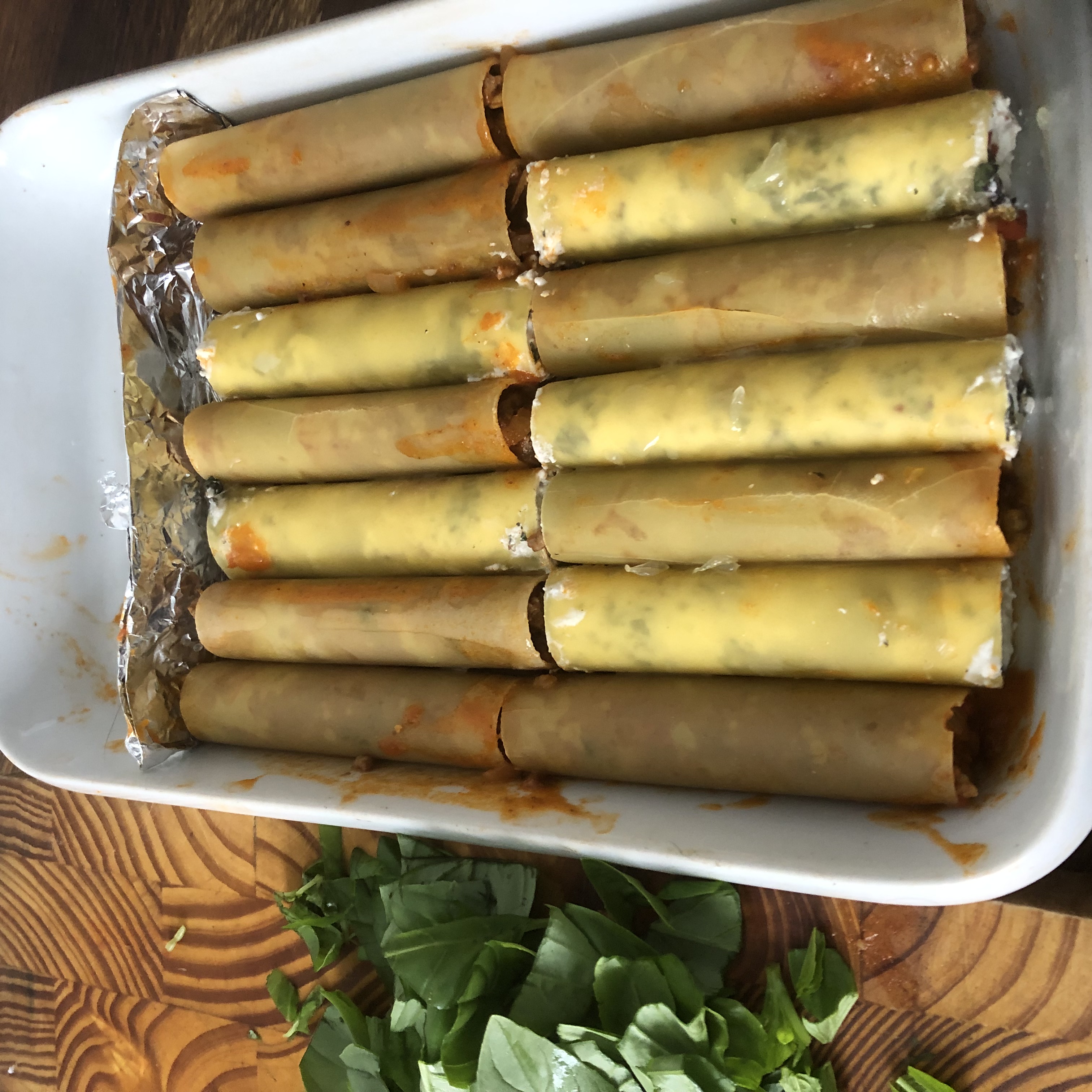 a tray of raw cannelloni 