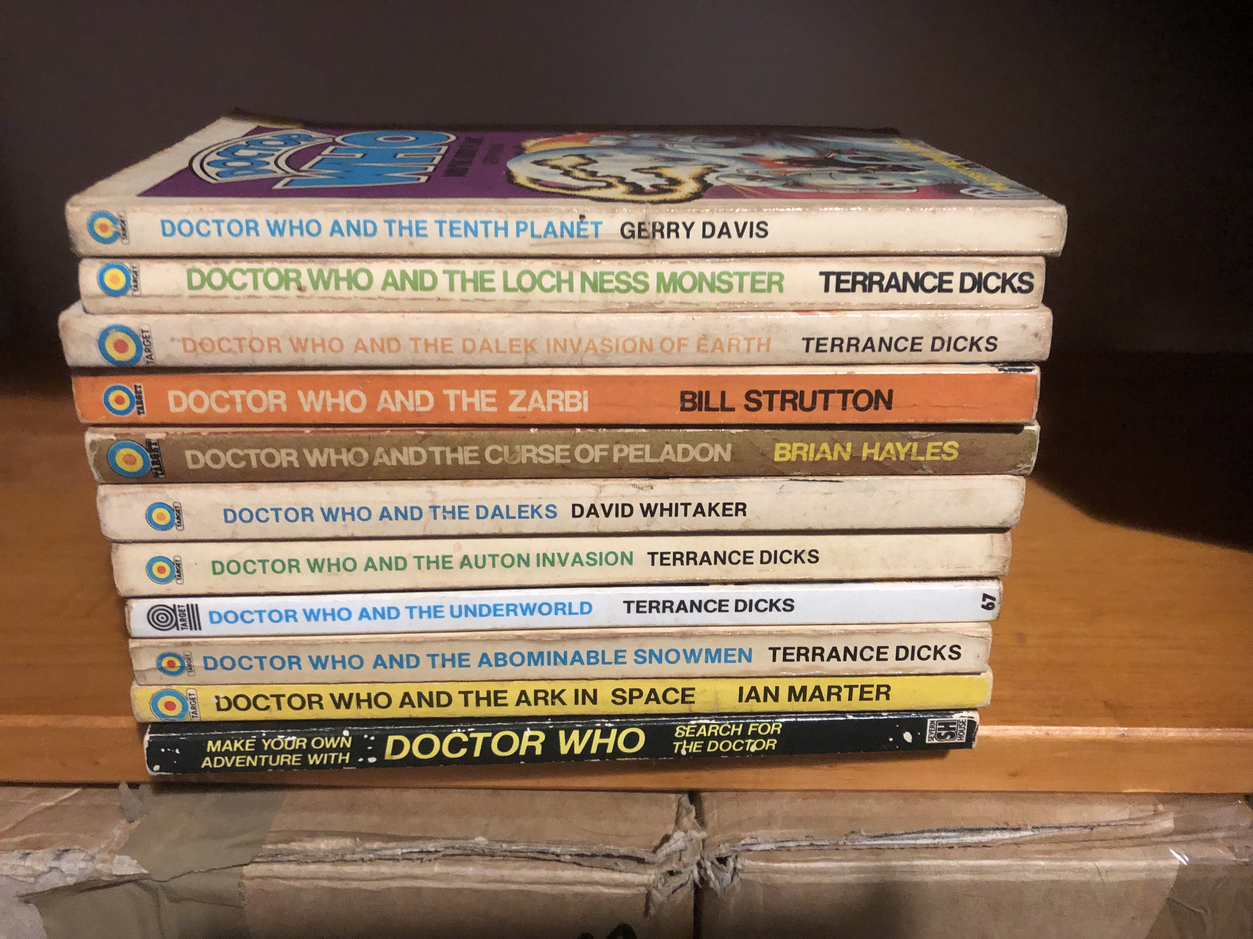 a pile of Dr Who books