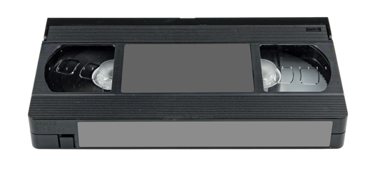 Picture of a VHS tape, seen from an angle that show both the top and front labels.