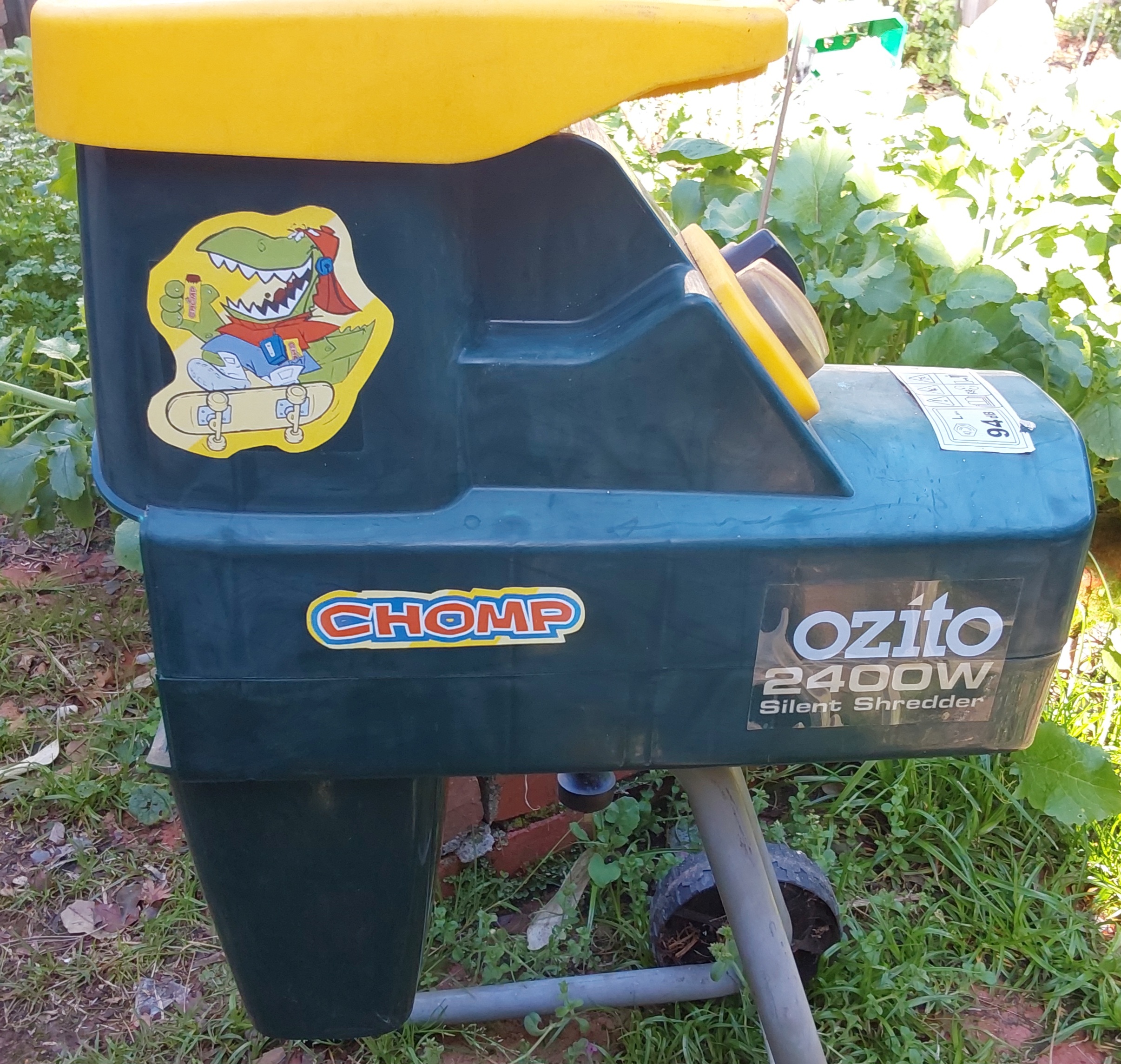 image of mulcher with stickers saying "Chomp" and with the image from Chomp chocolate bars